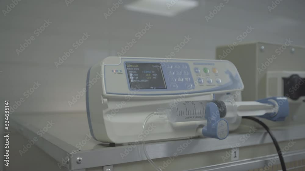 Syringe pump. Modern veterinary clinic. Professional medical equipment. Advanced equipment. Animal treatment. Care for animals Syringe pump. Modern veterinary clinic. Professional medical equipment. Advanced equipment. Animal treatment. Care for animals