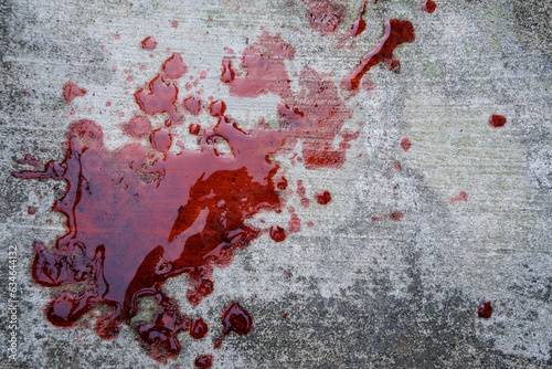 blood spills on the cement floor. concept photo illustration of murder and blood vomiting disease © Muhammad