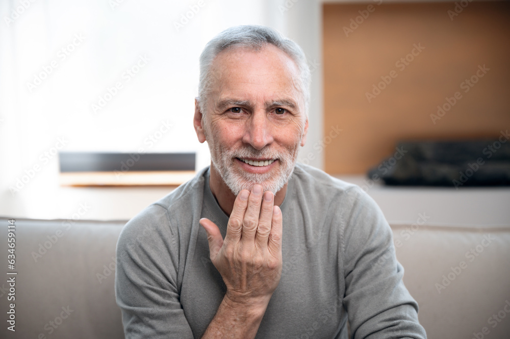 middle aged man communicate with sign language by video call middle aged man communicate with sign language by video call