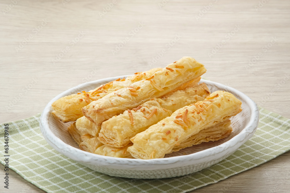Cheese Stick Pastry served on white bowl
Cheese Stick Pastry served on white bowl