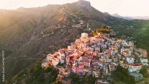 Spectacular Aerial Sunset Views of Taormina and Castelmola Medieval Villages | Italy's Charming Historic Landscapes from Above photo