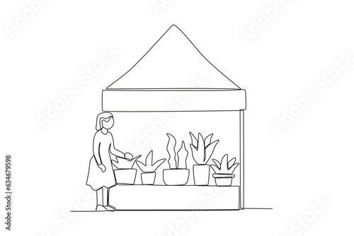 One continuous line drawing of a buyer looking at plants for sale 