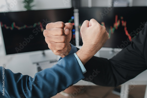 Stock investors shaking hands  business man trading stocks for profit  stock market oscillating graph screen  investment management  analyzing profit trading in stocks.