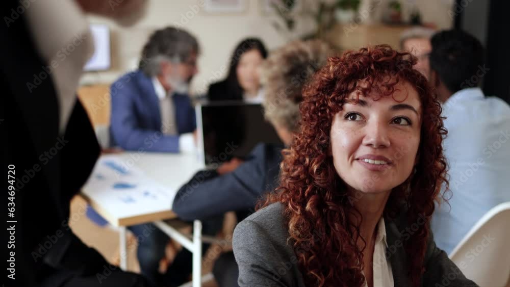 Business woman working inside bank office - Entrepreneur finance team concept - Focus on latin girl face