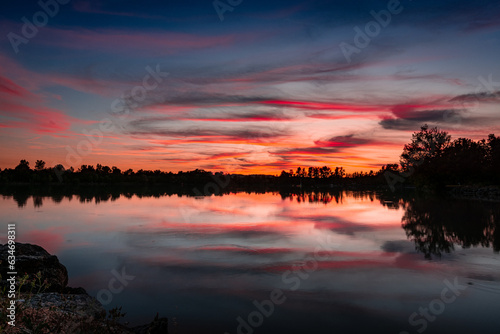 Beautiful sunset over Dicosa Lake, Tarn, France