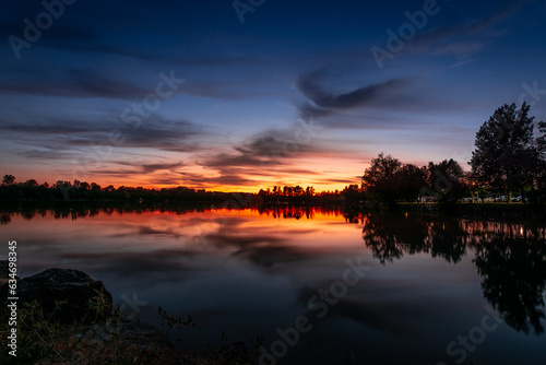 Beautiful sunset over Dicosa Lake, Tarn, France