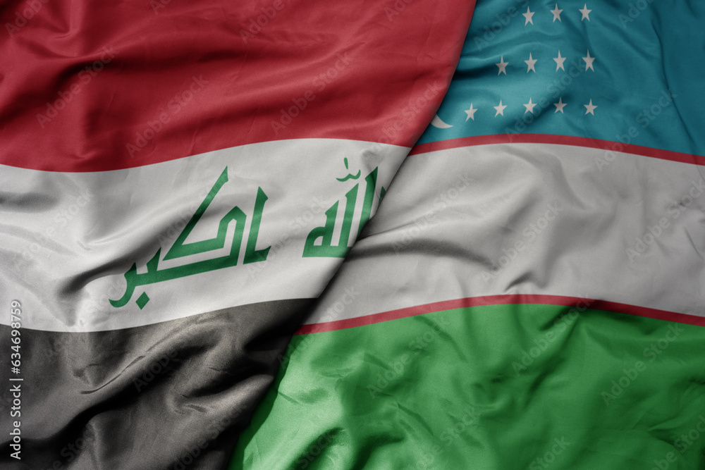big waving realistic national colorful flag of iraq and national flag of uzbekistan .