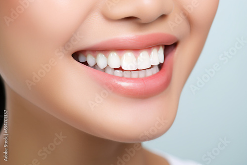 A close-up portrait of a stunning young Asian-Indian woman, smiling with pristine teeth. Used for a dental advertisement. Set against a white background. Composed using the rule of thirds. Gen. AI