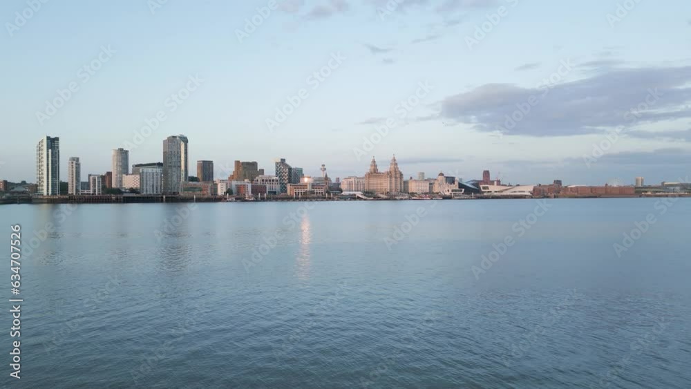 Fast aerial approach over water towards Liverpool skyline, Merseyside, England Fast aerial approach over water towards Liverpool skyline, Merseyside, England
