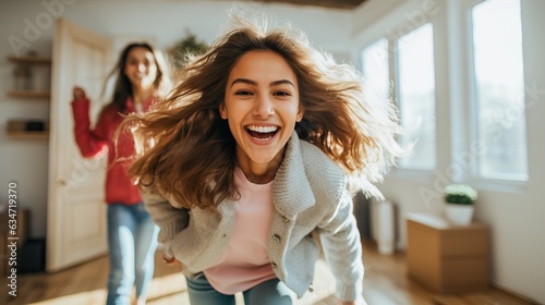 Happy young people moving i...