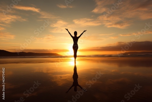 Girl in yoga pose on the beach