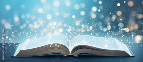 Magic book on blue background