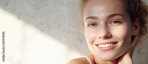 Digital composite featuring a Caucasian woman smiling and wiping her cheek with text for International Skin Pigmentation Day Focus on pigmentation skincar photo