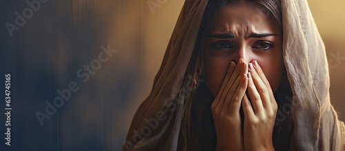 Composite image of a woman crying at home on International Widows Day emphasizing sadness injustice and social issues