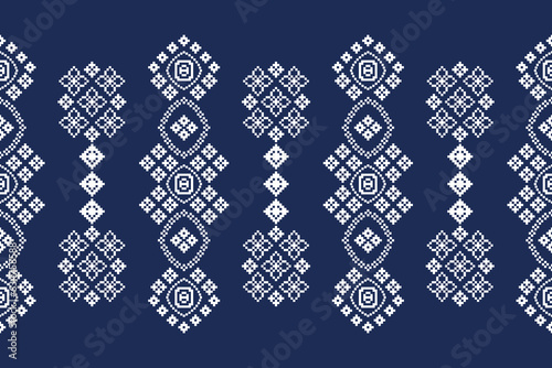 Ethnic geometric fabric pattern Cross Stitch.Ikat embroidery Ethnic oriental Pixel pattern blue background. Abstract,vector,illustration. Texture,clothing,frame,decoration,motifs,silk wallpaper.