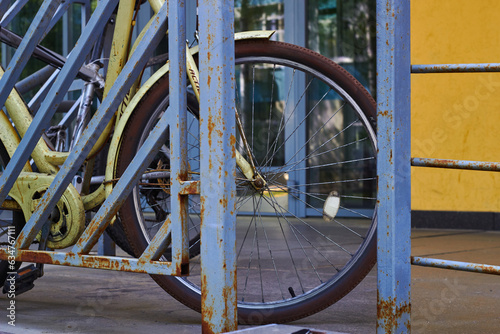 parked bikes tires and wheels and spokes. © Electrovenik