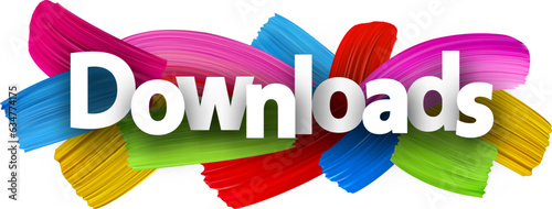 Downloads paper word sign with colorful spectrum paint brush strokes over white.