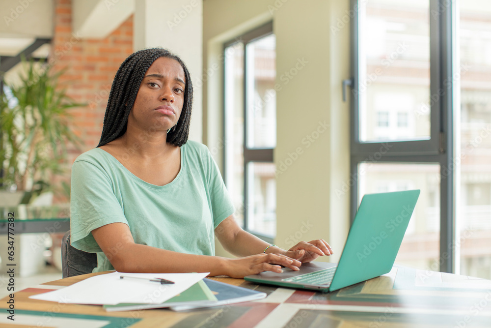black afro woman feeling sad and whiney with an unhappy look and crying. studying concept black afro woman feeling sad and whiney with an unhappy look and crying. studying concept