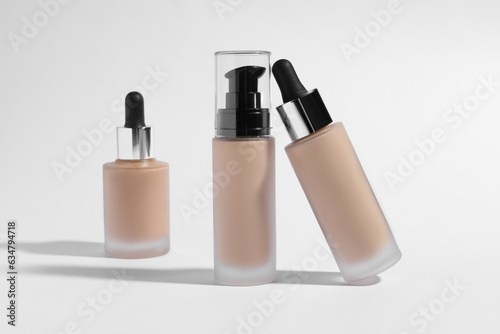 Schilderij op canvas Bottles of skin foundation on white background. Makeup product