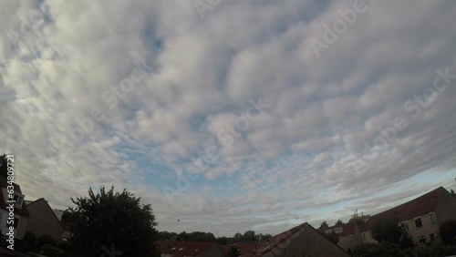 Time lapse of large fields of altocumulus clouds, passing by.