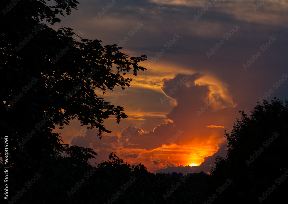 Sunset with man in the clouds. Sunset with man in the clouds.