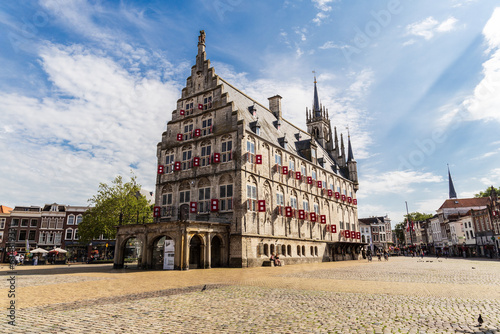 View of the city hall in Gouda, Netherlands. Zuid-Holland. Sightseeing with blue sky (ID: 634819331)