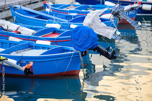Fishing boats in the harbor of Matera, Puglia, Italy photo