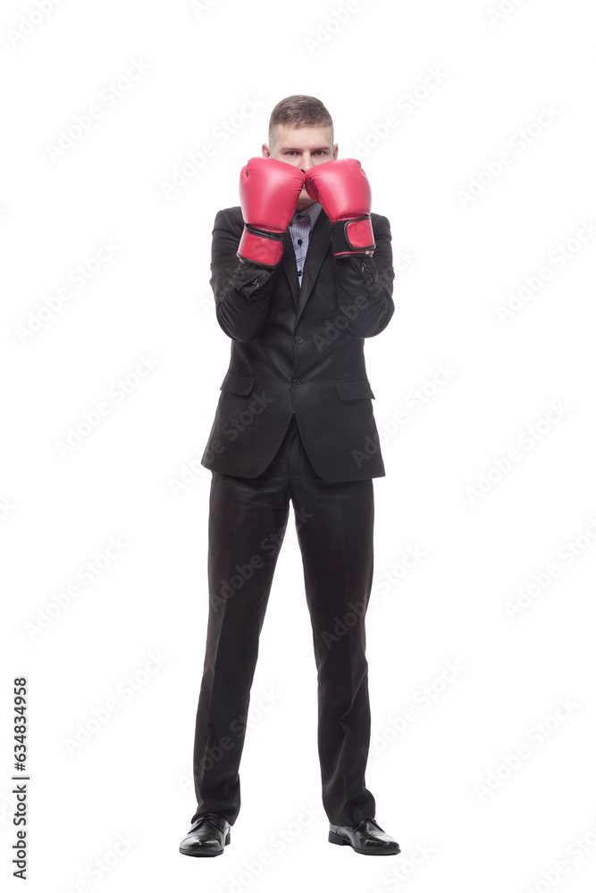in full growth. young businessman in Boxing gloves. in full growth. young businessman in Boxing gloves.