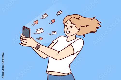Woman with phone gets lot of messages and likes on social media and rejoices at popularity of personal blog on internet. Letters with hearts fly out of smartphone of smiling girl using social networks