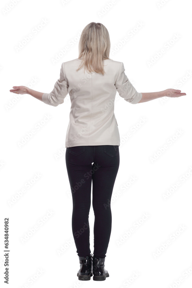 casual woman in a white jacket looking at a white screen. casual woman in a white jacket looking at a white screen.