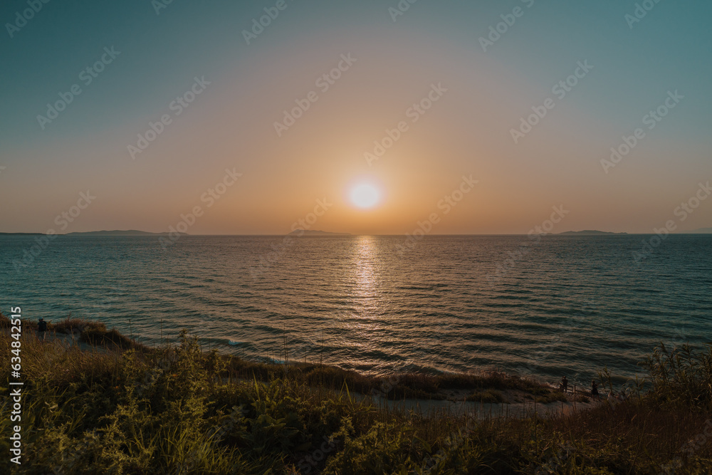 Fototapeta premium Idyllic seascape seen from mountain during sunset