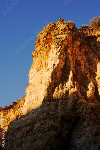 Cliffs in the evening light by Lagos, Algarve.