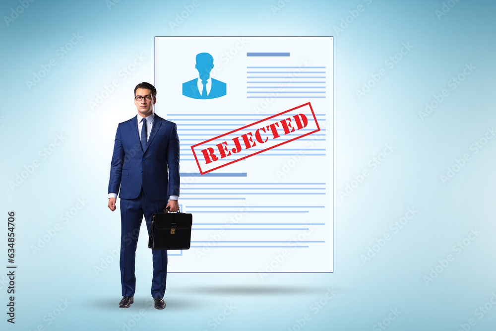 Man receiving rejection notice on his cv Man receiving rejection notice on his cv
