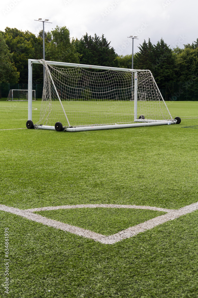 Naklejka premium A empty goal posts in a empty football pitch 