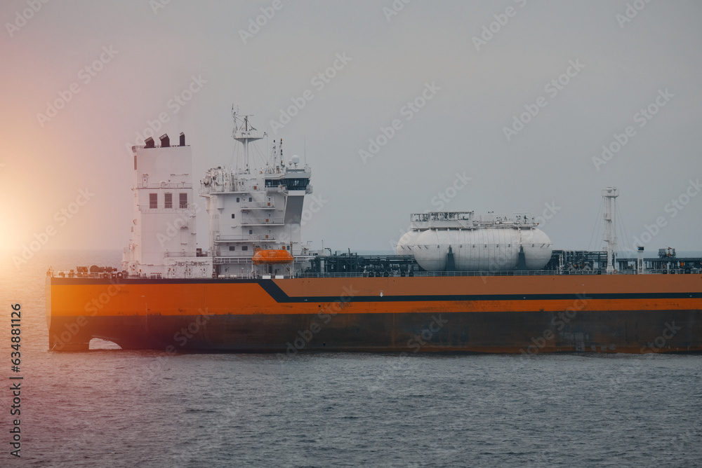 Obraz premium LNG-powered tanker in ballast condition awaiting orders. Dual fuel engine. Oil tanker banned from entering the port.