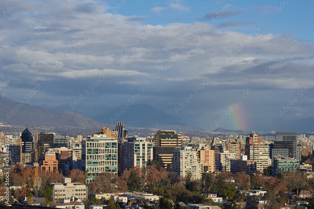 View of the city of Santiago on a sunny day with clouds