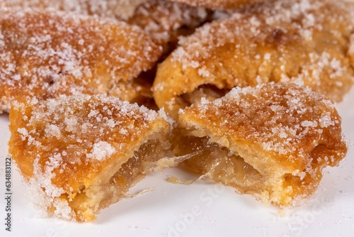 Fried sweet (borrachuelo) stuffed with angel hair, a typical Spanish dessert from Andalusia. Ideal for Christmas and Easter. photo