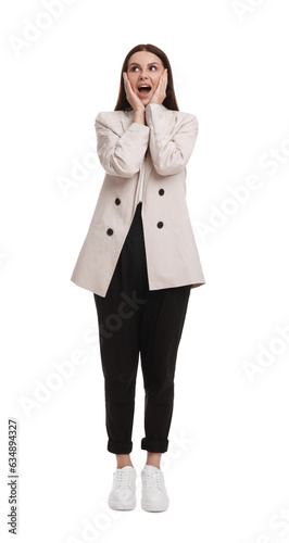 Beautiful emotional businesswoman in suit on white background