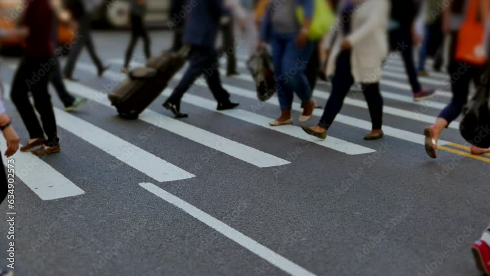 Pedestrians Commuting on Crowded Street in Rush Hour Traffic Pedestrians Commuting on Crowded Street in Rush Hour Traffic