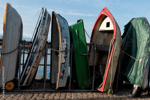 Small boats by the harbour photo