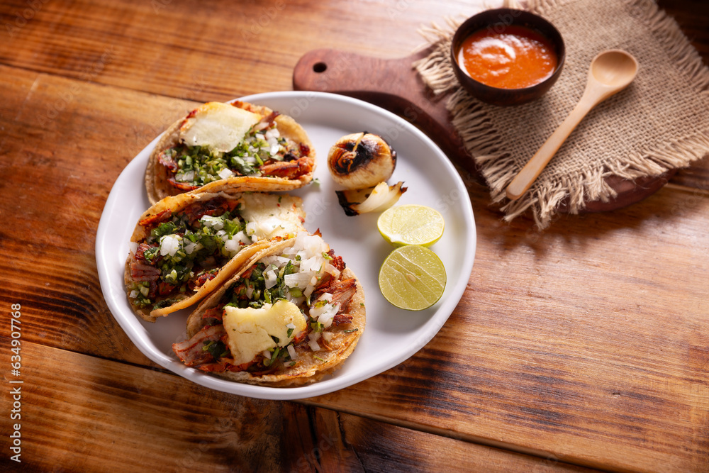Tacos al pastor. Also known as Tacos de Trompo, they are the most