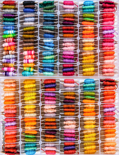 Multicolor threads for embroidery cross-stitch  mulina. Color background