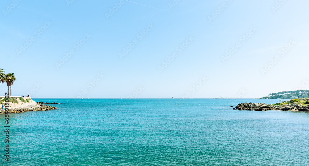 View across blue Mediterranean Sea to distant horizon View across blue Mediterranean Sea to distant horizon