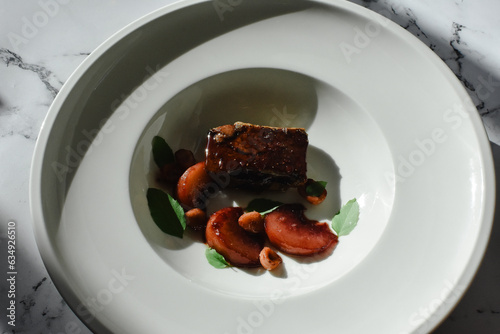 Foie Gras With Peach Slices and Hazelnuts