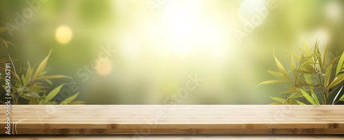 empty wooden table with bamboo on blurred forest tree background