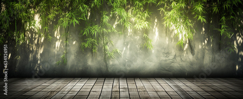 empty wooden surface blurred bamboo tree background © Strabiliante