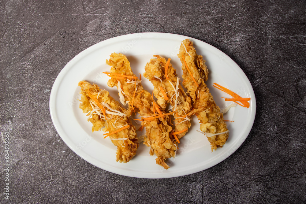 crispy fried shrimp served in dish isolated on background top view of bangladesh food crispy fried shrimp served in dish isolated on background top view of bangladesh food