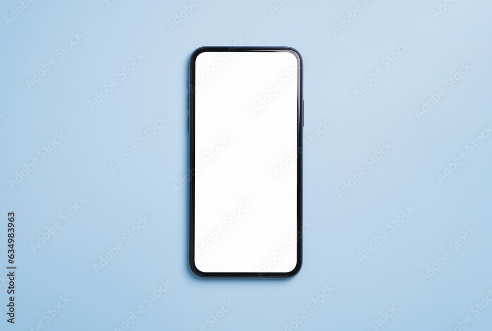 Top view of black smartphone with blank screen on blue background. Top view of black smartphone with blank screen on blue background.