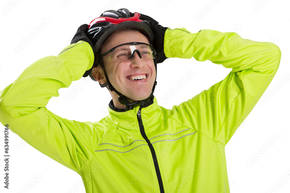 Professional Cyclist Posing Equipped in Green Jacket With Glasses and Helmet Professional Cyclist Posing Equipped in Green Jacket With Glasses and Helmet