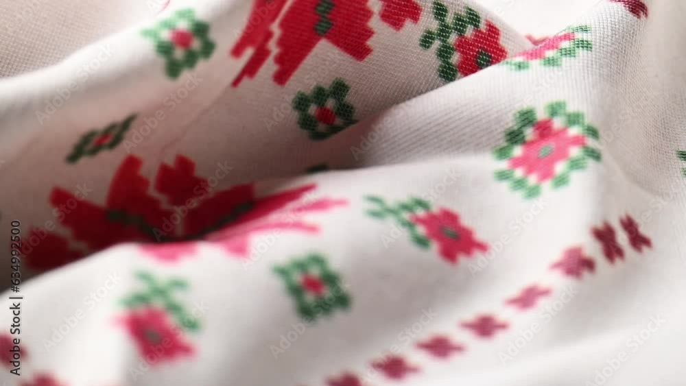 White linen cloth with traditional folk motifs
White linen cloth with traditional folk motifs